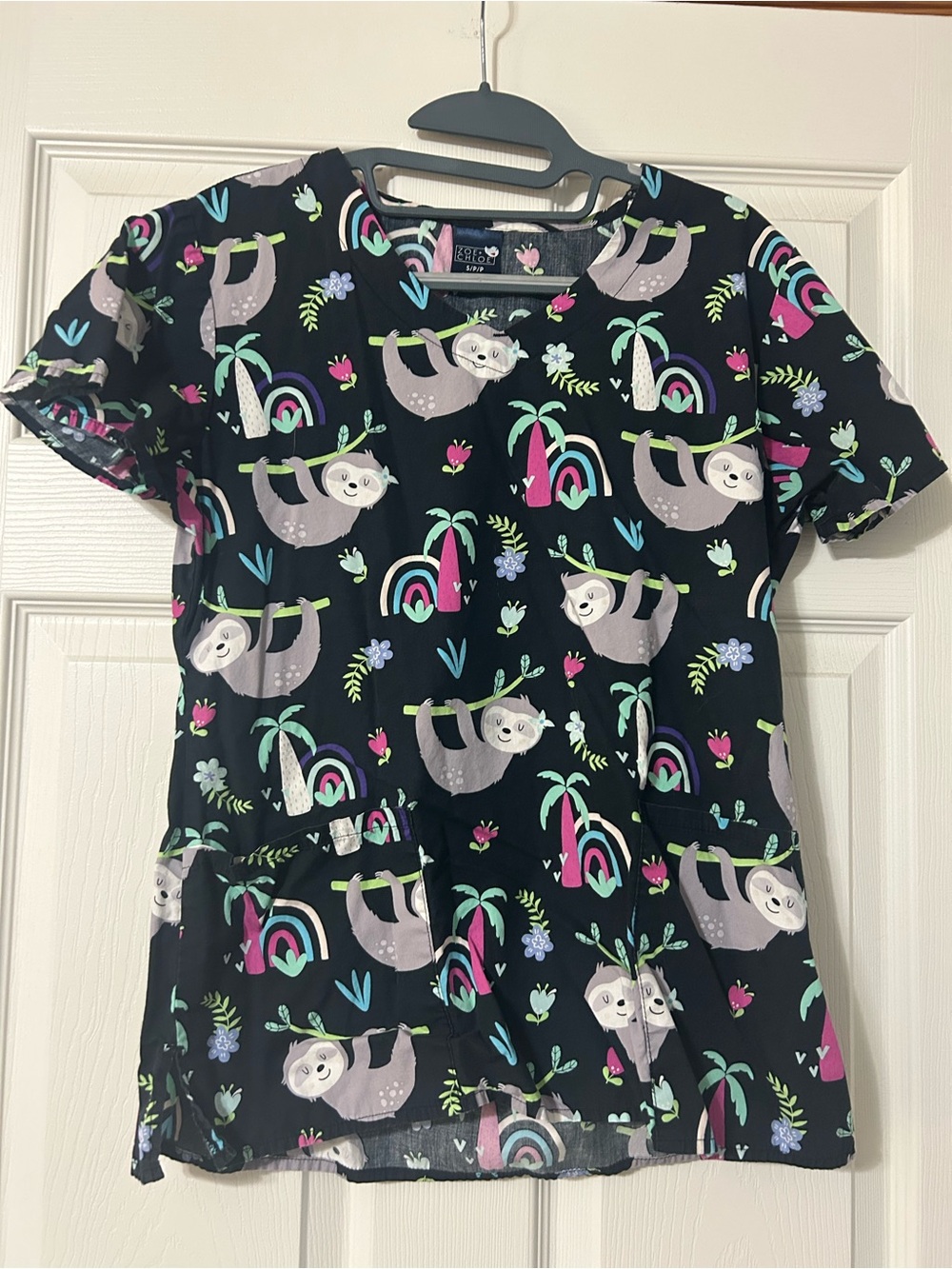 Black Sloth Print Scrub Top with Colorful Rainbows